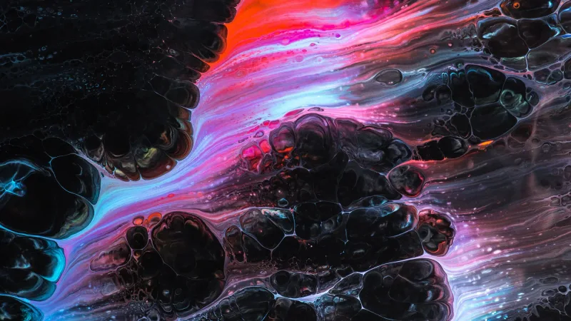 Textura abstracta oscura con una franja de tinta roja, rosa y azul