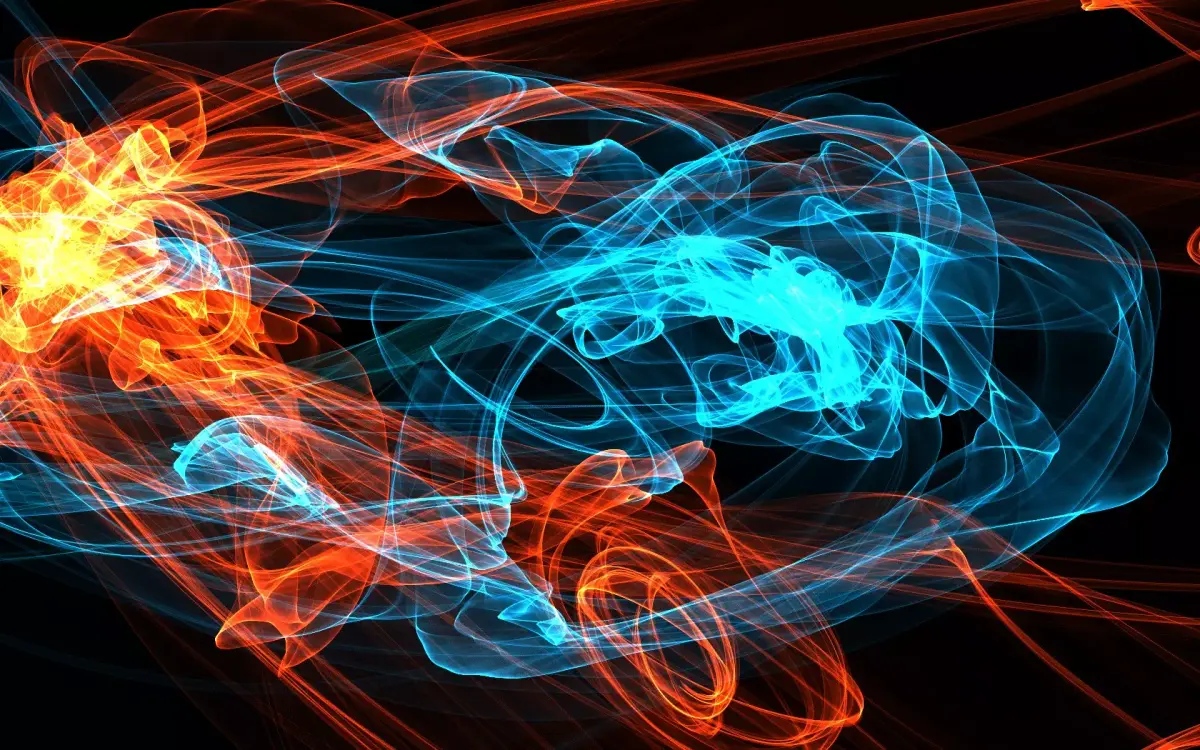 Remolinos abstractos de energía naranja y azul simulando fuego y hielo