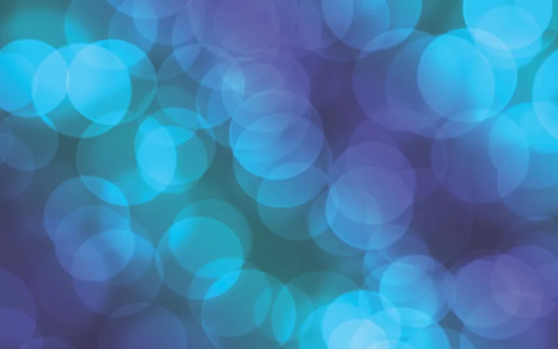 Fondo abstracto de círculos difuminados en tonos azul, turquesa y morado