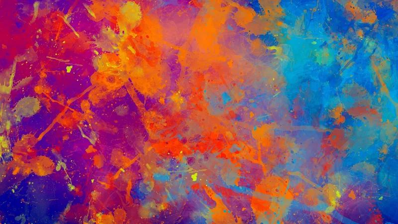 Textura abstracta de salpicaduras de pintura en rojo, naranja, morado y azul