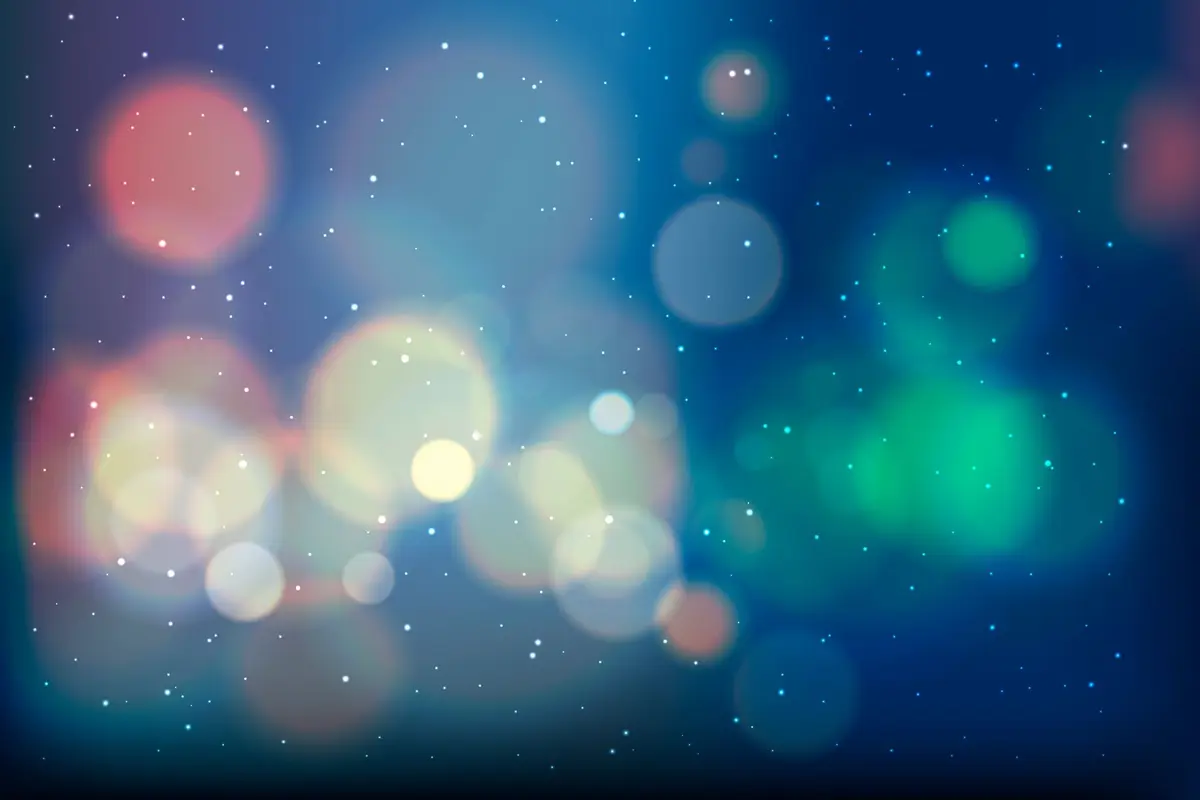 Fondo bokeh con círculos difuminados en azul, verde y rojo