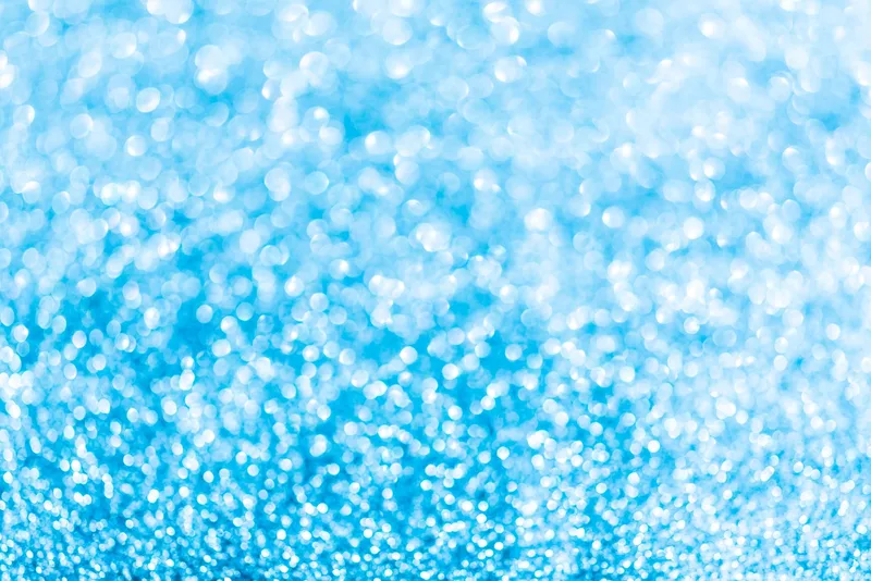 Fondo abstracto de luces azules desenfocadas en efecto bokeh
