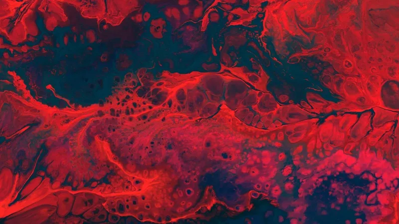 Textura abstracta de pintura roja fluida con burbujas y vetas oscuras