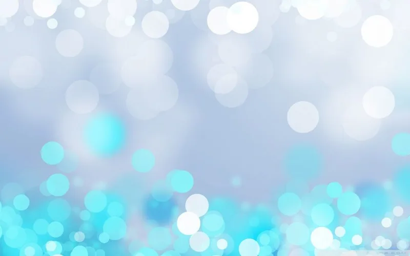 Fondo con círculos de luz difuminados en tonos blanco y celeste