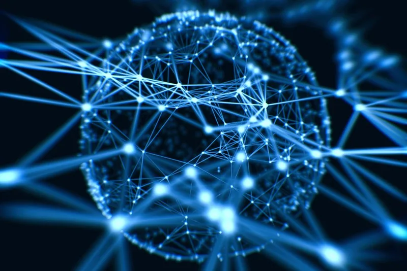 Esfera de red digital azul formada por nodos y líneas conectadas