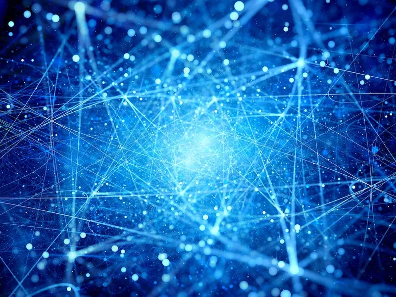 Red de líneas y partículas azules brillantes convergiendo hacia el centro