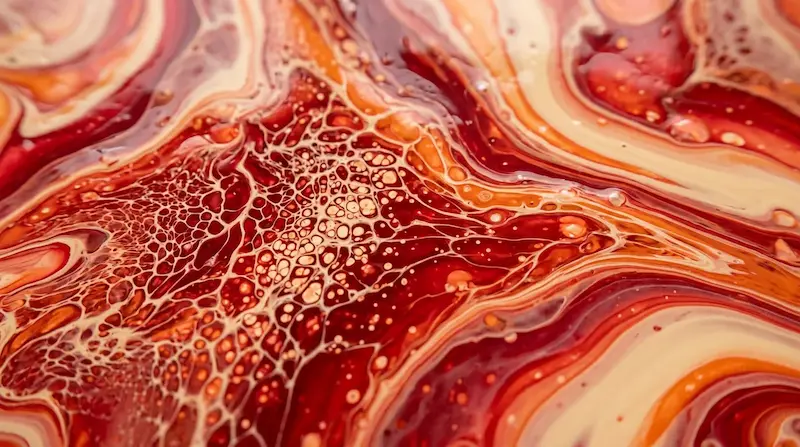 Ilustración abstracta de pintura fluida en tonos rojo, naranja y crema para la noticia: Node2Shell ejecuta código en Node.js 24.22.0 desde un stream Brotli